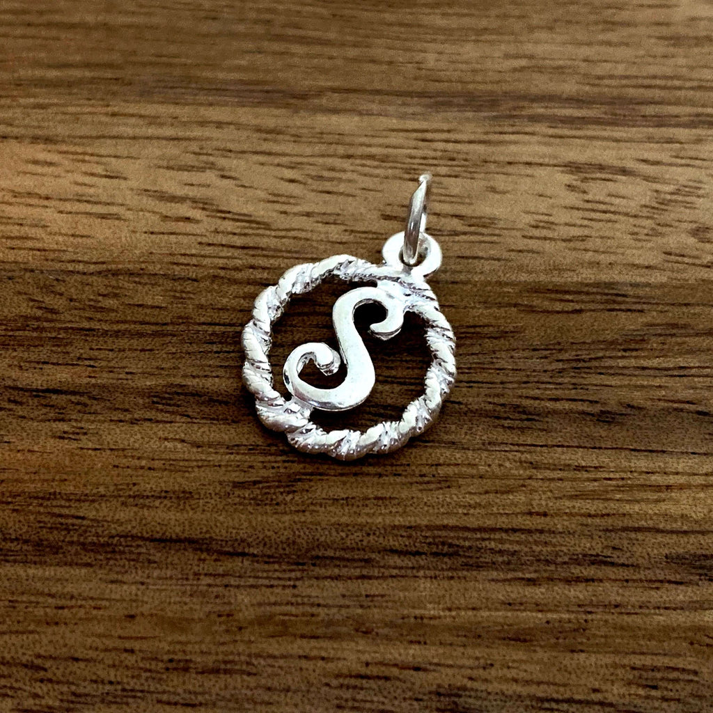 S initial charm