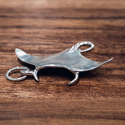 Silver stingray charm front view