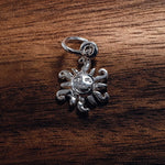 Silver Sun charm