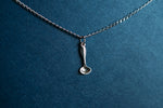 Ladle charm on a sterling silver necklace